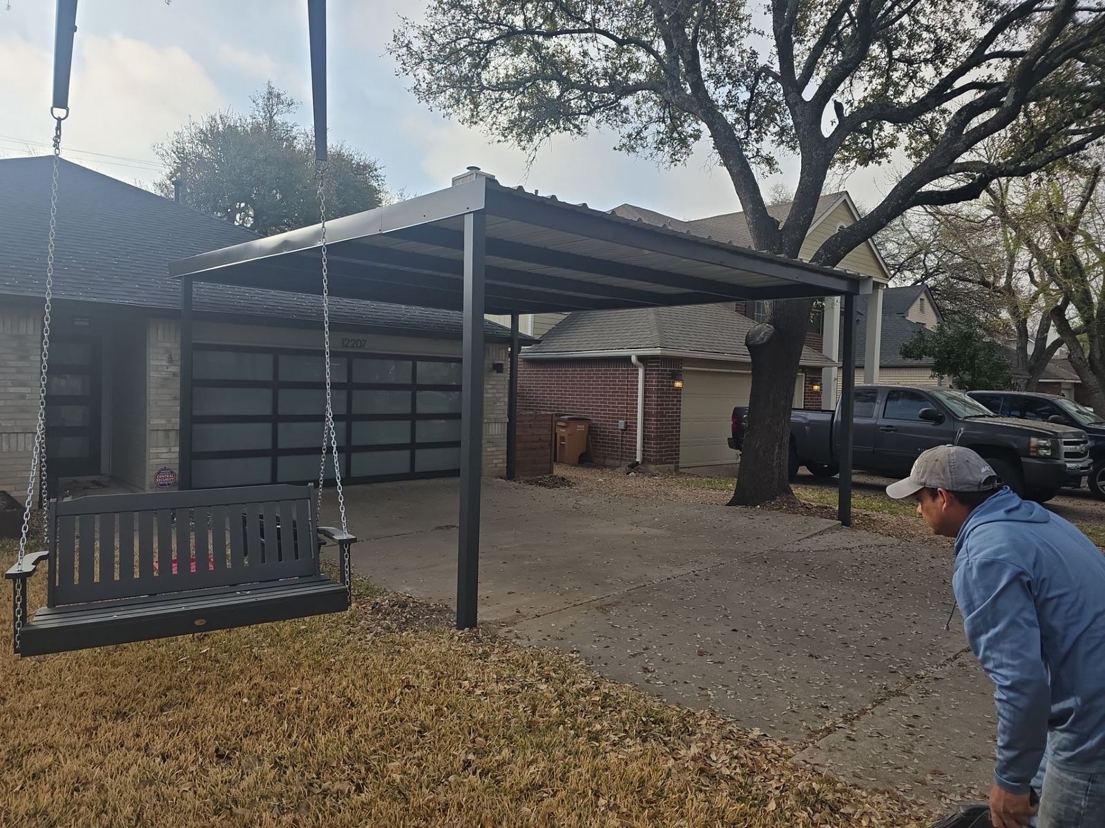 Wood decking and metal carports by Austin Area Roofers · hand-picked by Dennis White from a recent CompanyCam project